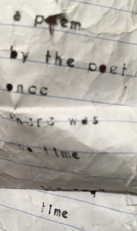 poem typewritten on torn looseleaf
                              paper