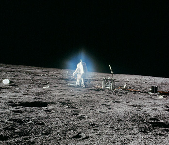 Alan Bean, Apollo
                              12 - Lens flare or gas emissions?